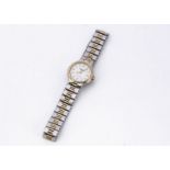 A c1990s Longines Conquest Quartz stainless steel lady's wristwatch, 22mm, with bi-metal strap and