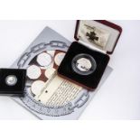 Victorian Cross related modern coins, including a Royal Mint silver 50p, a 2006 UK coin set with