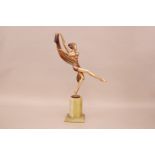 An Art Deco bronze figure of a dancing lady after Lorenzl, 47.5cm, on green hardstone base, some