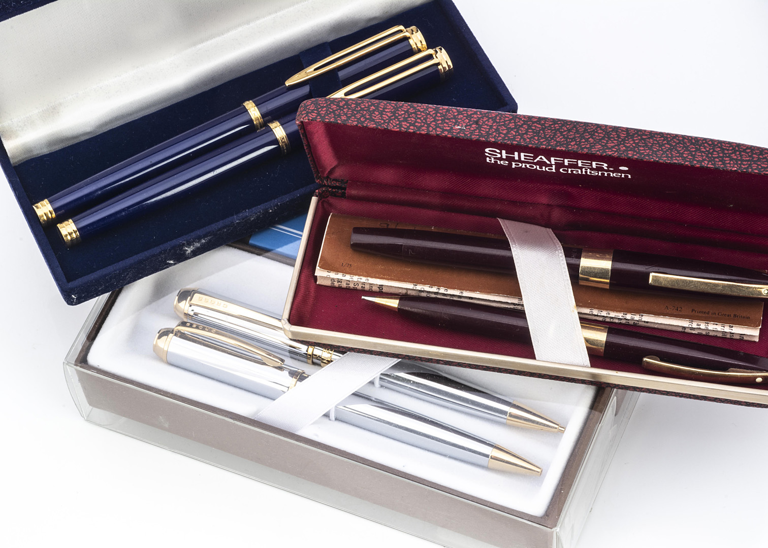 A vintage Sheffer fountain pen and pencil set in box, together with a Waterman set, boxed, and an