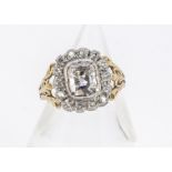 A 19th Century old cut diamond dress ring, centred with a rectangular old cut in rubbed over