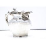 A George V silver covered jug from Davidson Henderson & Sorley of Glasgow, 12cm high, 9.5 oz.,