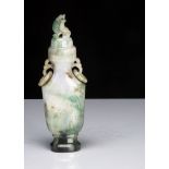 A Chinese jadeite jade carved archaic style vessel and cover, with carved landscape and deer