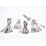 An harlequin canteen of William IV and Victorian silver cutlery for six, fiddle and shell pattern,
