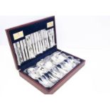 A modern canteen of silver plated cutlery by Viners, bead pattern in wooden box, appears unused
