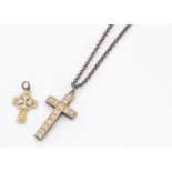 A 9ct gold Celtic cross pendant, 3cm x 2.5cm, together with a 19th Century engraved cross pendant on