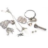 A quantity of silver jewels, including an interesting white metal seal ring with portrait of