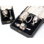Two cased silver Christening sets, including a egg cup and spoon set, the other with mug, bent and