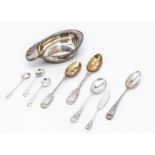 A George III silver pap boat, together with a pair of silver berry teaspoons, a silver teaspoons,