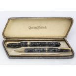 A vintage Conway Stewart 58 fountain pen and pencil set, in grey design, in Conway Stewart box (3)