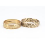 Two 9ct gold wedding bands, one set with multiple paste stones, ring size U, some settings vacant,