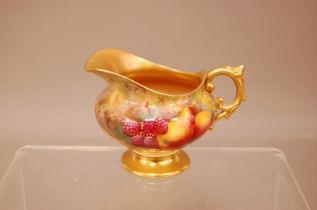 An early 20th century Royal Worcester Porcelain small jug, 7.8cm high, with painted pears and