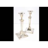 A pair of Edwardian silver filled by HE, 29.5cm, squared and in the neo-classical taste, Sheffield