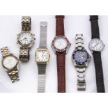 A collection of vintage and modern watches, including an Aqua Master, two Casio watches and more