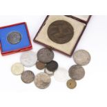 A small group of coins and medallions, including two 1935 crowns, VF, another 1935 crown, worn,