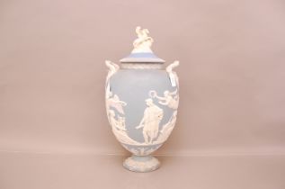 A large 19th century Wedgwood pottery Jasperware "Pegasus" urn, damaged, with an associated cover,