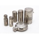 Six Victorian and later silver mounted scent bottles, one flask example, 7cm, the other with