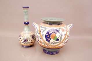 Two items of Arnhem pottery, the largest bottle vase 33.5cm, and the twin handled pot marked