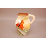 A restored Art Deco period Wilkinson & Co pottery jug by Clarice Cliff, 20cm, in the Lorna