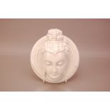 An interesting mid 20th century Indian blanc de chine bust on plaque, 20.5cm, with the head of a