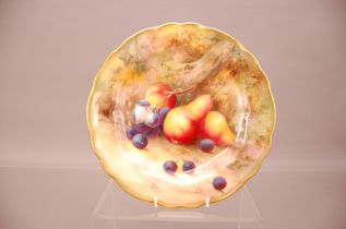 An early 20th century Royal Worcester Porcelain plate, 23.5cm, with painted pears and grapes by