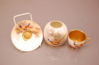 Three items of first half 20th century Royal Worcester porcelain, including a small globular vase