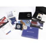 A collection of 10 modern Royal Mint Britannia one oz silver coins, eight boxed or in original