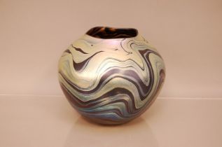 A modern Studio Glass bowl by Norman Stuart Clarke, 18cm high, with iridescent trailing to exterior,