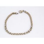 A 9ct gold curb linked and buckle bracelet, 21cm long, 7.3g