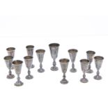 A group of 12 silver Kiddish cups, all similar in design, varying sizes and makers, AF (12)