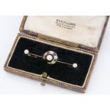 An Edwardian sapphire and diamond crescent brooch, centred with a button pearl on a gold bar, 4.2cm,