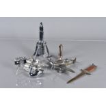 A collection of novelty table lighters, including a chrome plated Rocket on stand, a Submarine, a