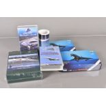 A collection of Concorde related items, to include posters, VHS tapes, models, mugs and more (