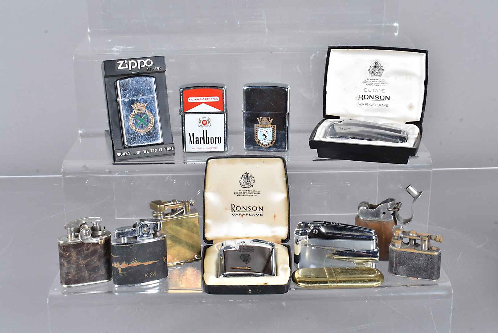 A collection of various lighters, to include Ronson Varaflame in box, small Ronson Varaflame in box,