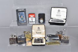 A collection of various lighters, to include Ronson Varaflame in box, small Ronson Varaflame in box,