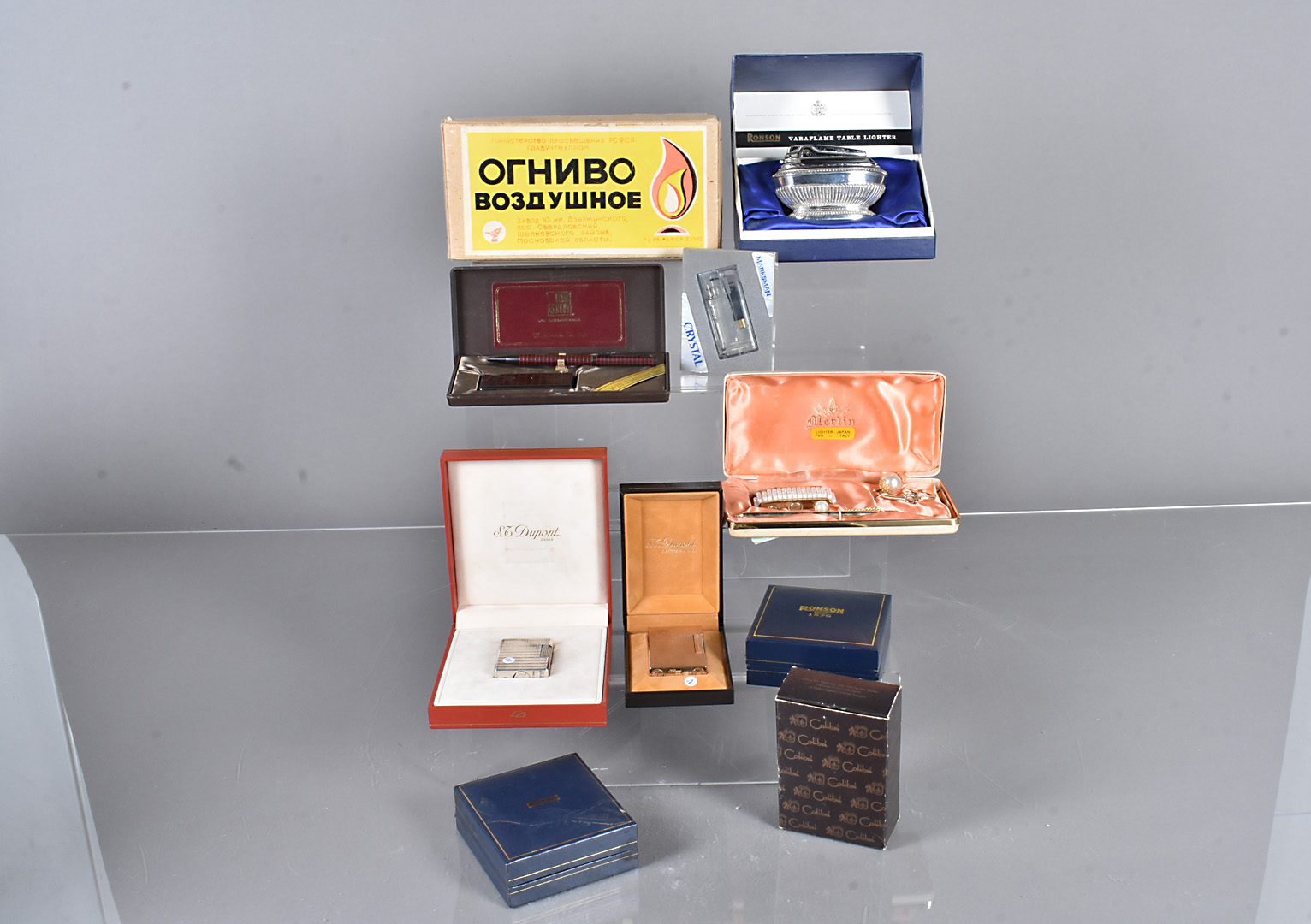 Two boxed Dupont lighters in original retailers boxes, together with a collection of twelve other