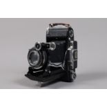 A Zeiss Ikon Super Ikonta Folding Camera, 531/2, shutter sluggish on slow speeds, focusing stiff,