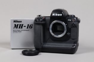 A Nikon D1x DSLR Camera Body, serial no 5132059, body G-VG, some light wear, with body cap,