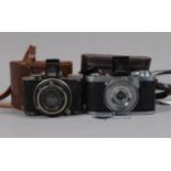 A Nagel Pupille and a Zeiss Ikon Tenax I Cameras, Pupille format 3 x 4cm on 127 roll film, Compur