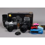 A Nikon D40 DSLR and Other Items, serial no 7496140, powers up, takes a picture, otherwise untested,