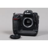 A Nikon D2Hs DSLR Camera Body, serial no 3007593, body G, some wear, with body cap, battery and MH-