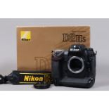 A Nikon D2Hs DSLR Camera Body, serial no 3007853, body G-VG, some light wear, with body cap, display