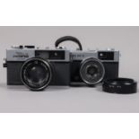 Two Olympus Compact Cameras, an Olympus 35 RD, shutter working, meter responsive, self timer