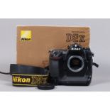 A Nikon D2x DSLR Camera Body, serial no 5014157, body G, light wear, with body cap, strap, manual,