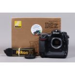 A Nikon D2x DSLR Camera Body, serial no 5041806, body G, some wear, with body cap, strap, manual,