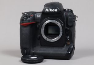 A Nikon D3 DSLR Camera Body, serial no 2002523, body G, light wear, with body cap, battery and MH-22