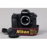 A Nikon D1H DSLR Camera Body, serial no 5210225, body G, some wear, with body cap, display screen