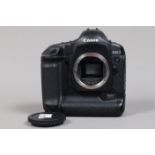 A Canon EOS-1D Mark II DSLR Camera Body serial no 249163, body G, some scratches to base, with