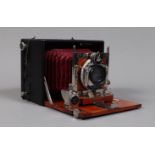 An Ernemann Heag VI Double Shutter Folding Plate Camera, circa 1920, 9 x 12cm format, body G,