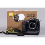A Nikon D2x DSLR Camera Body, serial no 5070189, body G, light wear, with body cap, display screen